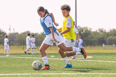 Young players developing soccer skills during a Fundación Real Madrid camp in Calgary